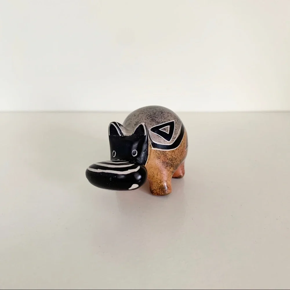 Stone hippo statuette